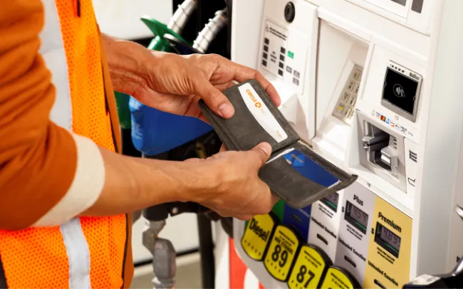 Customer using fleet card at Circle K fuel pump