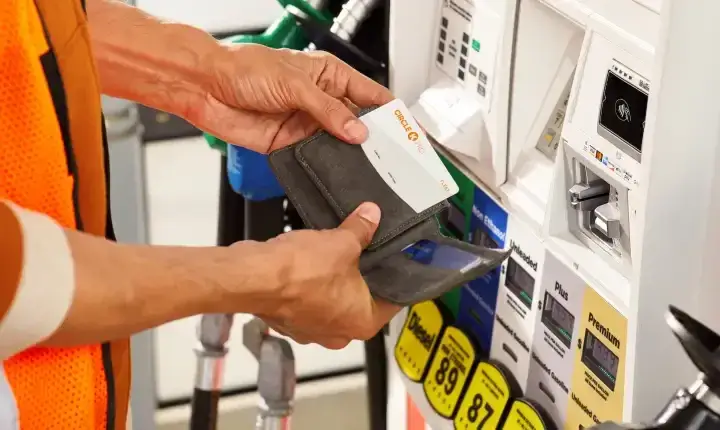 Customer using Circle K fleet card at fuel pump