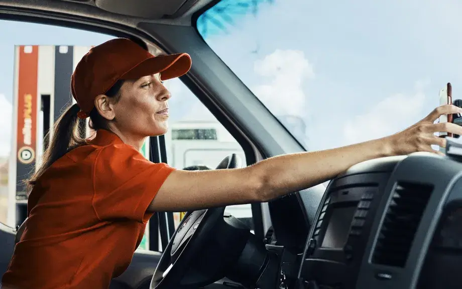 Long haul truck driver reaches for Circle K drink