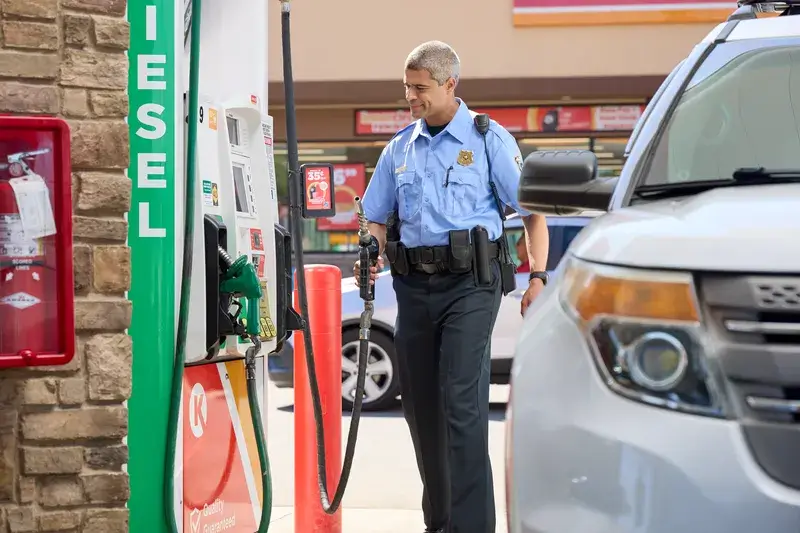 police pumping gas