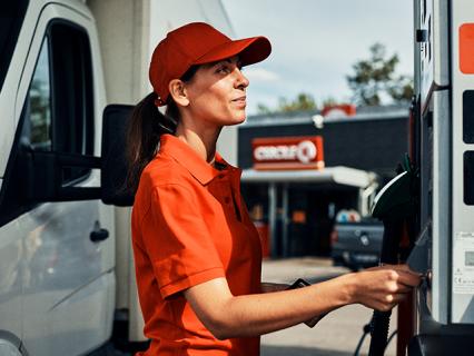 Driver selecting fuel type at Circle K station